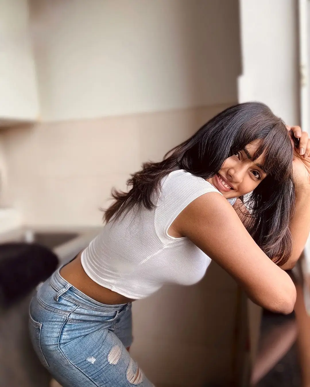 Eesha Rebba Stills in Beautiful White T Shirt Blue Jeans